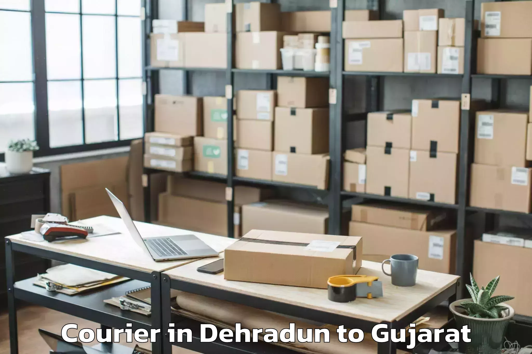 Get Dehradun to Dhuvaran Courier